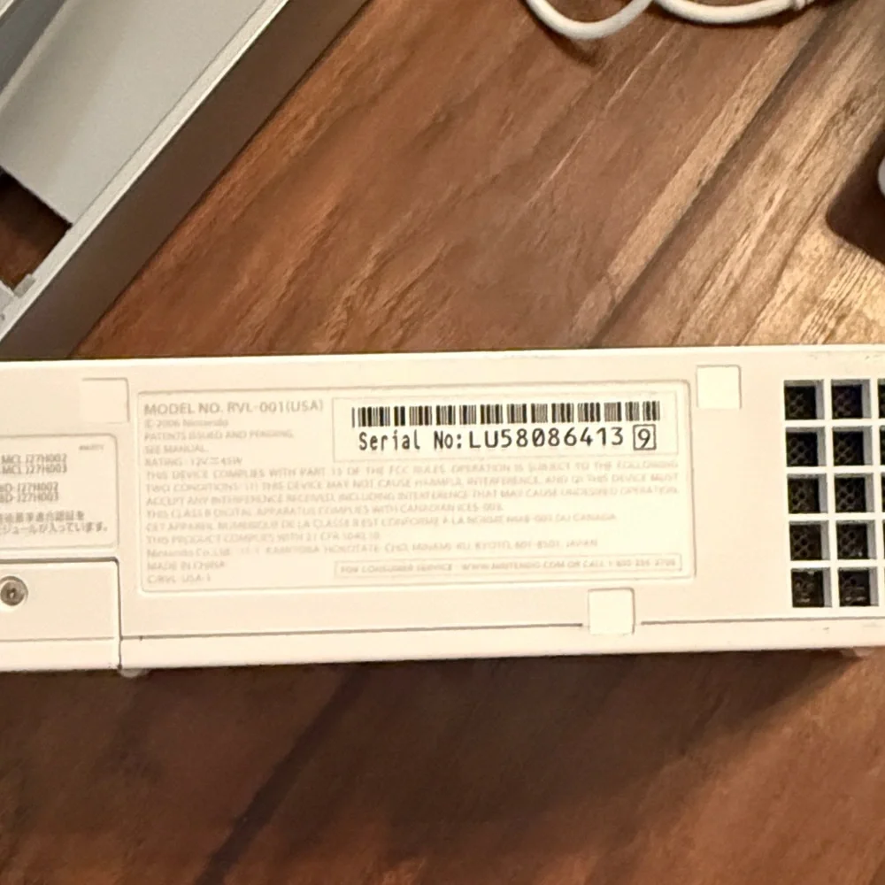 Nintendo Console with White and Gray Accessories